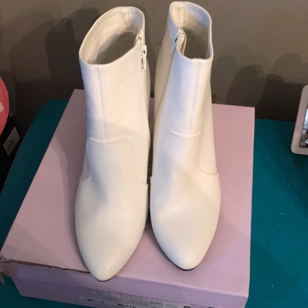 White and gold wedge booties